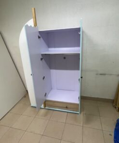 The photo shows a children's wardrobe with a distinctive nautical design in blue and white with wooden details and wave-like top edges. - Image 5