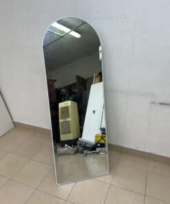 A full-length floor mirror featuring an arched design with a curved top, a white frame, and a black metal back stand; it resembles the Noon East arched mirrors available on Noon or similar freestanding mirror designs found on Amazon UAE. - Image 2