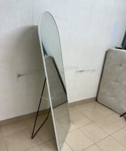 A full-length floor mirror featuring an arched design with a curved top, a white frame, and a black metal back stand; it resembles the Noon East arched mirrors available on Noon or similar freestanding mirror designs found on Amazon UAE. - Image 3