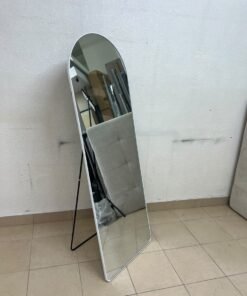A full-length floor mirror featuring an arched design with a curved top, a white frame, and a black metal back stand; it resembles the Noon East arched mirrors available on Noon or similar freestanding mirror designs found on Amazon UAE. - Image 4