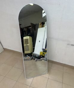 A full-length floor mirror featuring an arched design with a curved top, a white frame, and a black metal back stand; it resembles the Noon East arched mirrors available on Noon or similar freestanding mirror designs found on Amazon UAE. - Image 6