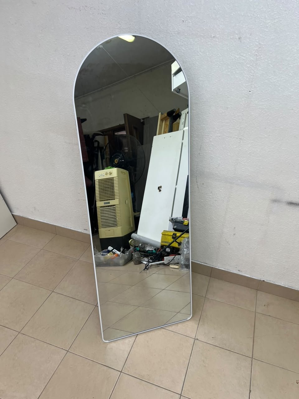 A full-length floor mirror featuring an arched design with a curved top, a white frame, and a black metal back stand; it resembles the Noon East arched mirrors available on Noon or similar freestanding mirror designs found on Amazon UAE. - Image 6