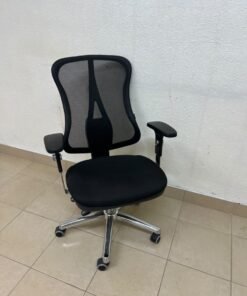 The Topstar Head Point is a comfortable office chair featuring a breathable black mesh back with built-in lumbar support and a shiny silver metal base.