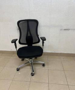 The Topstar Head Point is a comfortable office chair featuring a breathable black mesh back with built-in lumbar support and a shiny silver metal base. - Image 4