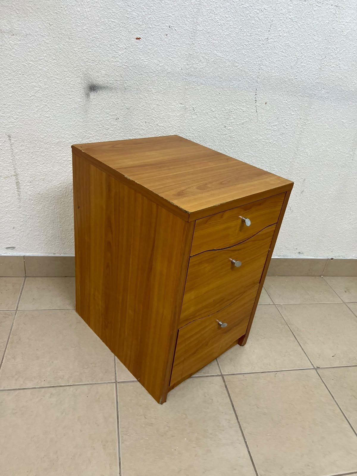 A wooden side table (nightstand) featuring three drawers with slightly curved fronts and small, round handles. - Image 5