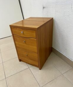 A wooden side table (nightstand) featuring three drawers with slightly curved fronts and small, round handles. - Image 2