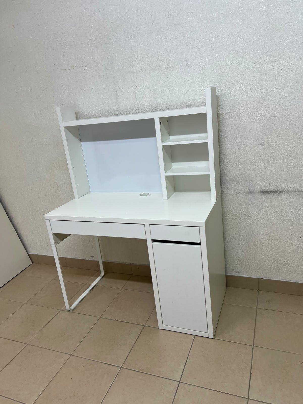 MICKE desk with high add-on unit in white from IKEA.