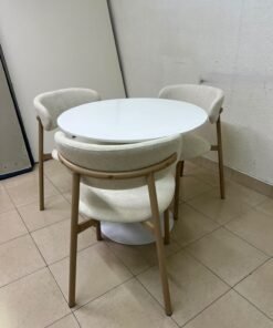 A white round dining table set featuring upholstered chairs with curved backrests and wooden legs; its design resembles the IKEA DOCKSTA / KRYLBO set. - Image 9