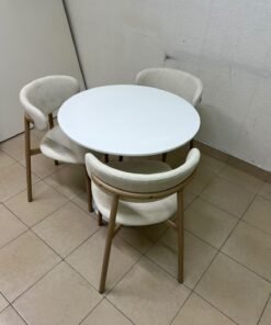 A white round dining table set featuring upholstered chairs with curved backrests and wooden legs; its design resembles the IKEA DOCKSTA / KRYLBO set. - Image 2