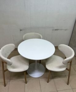 A white round dining table set featuring upholstered chairs with curved backrests and wooden legs; its design resembles the IKEA DOCKSTA / KRYLBO set. - Image 8