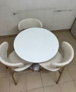A white round dining table set featuring upholstered chairs with curved backrests and wooden legs; its design resembles the IKEA DOCKSTA / KRYLBO set. - Image 12
