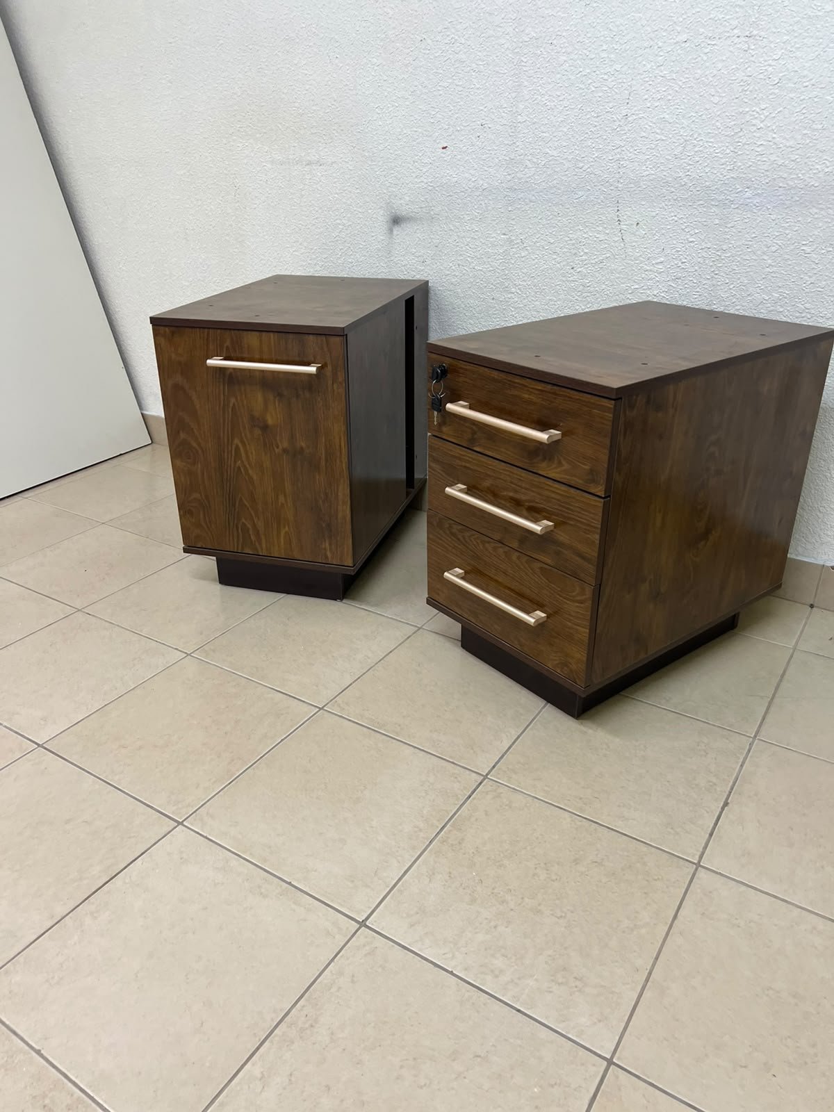 Wooden side/office drawer unit (storage cabinet) in Dark Walnut finish, featuring metal handles and a lock on the top drawer.