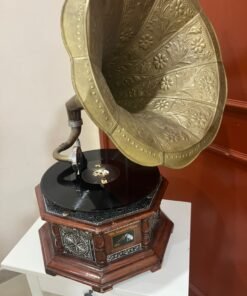 A vintage-style gramophone featuring an octagonal wooden base adorned with hand-engraved metalwork and a large, ornate brass horn, bearing the famous "His Master's Voice" logo. - Image 14