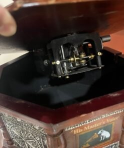 A vintage-style gramophone featuring an octagonal wooden base adorned with hand-engraved metalwork and a large, ornate brass horn, bearing the famous "His Master's Voice" logo. - Image 15