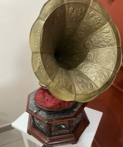 A vintage-style gramophone featuring an octagonal wooden base adorned with hand-engraved metalwork and a large, ornate brass horn, bearing the famous "His Master's Voice" logo. - Image 11
