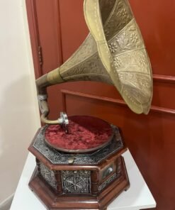 A vintage-style gramophone featuring an octagonal wooden base adorned with hand-engraved metalwork and a large, ornate brass horn, bearing the famous "His Master's Voice" logo. - Image 6