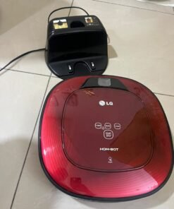 Red square-shaped robotic vacuum cleaner by LG (model LG Hom-Bot VR6270LVMB) with its charging base.