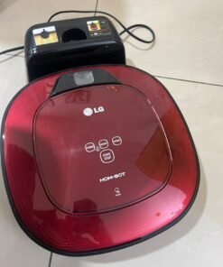 Red square-shaped robotic vacuum cleaner by LG (model LG Hom-Bot VR6270LVMB) with its charging base. - Image 6