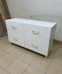 A modern, low-profile white chest of drawers (dresser) featuring a soft white finish, four spacious drawers (or double-fronted drawers), and gold or copper-toned pulls, all set on raised white legs. The design resembles contemporary storage units like the IKEA BESTÅ system or similar four-drawer cabinets. - Image 10