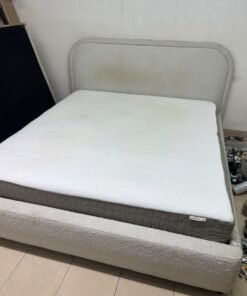 Modern upholstered double bed (featuring curved lines on the headboard and frame, covered in a textured fabric—such as bouclé, borg, or a woven textile—in a light beige or off-white shade), with a white top mattress resting on the bed base. 180x200 cm. - Image 4
