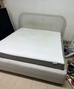 Modern upholstered double bed (featuring curved lines on the headboard and frame, covered in a textured fabric—such as bouclé, borg, or a woven textile—in a light beige or off-white shade), with a white top mattress resting on the bed base. 180x200 cm. - Image 8