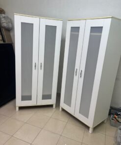 Two IKEA Aneboda wardrobes (or similar white, two-door models with ribbed-glass doors).