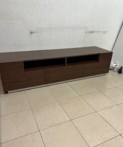 A modern wooden TV stand (media unit) in a dark brown (walnut) finish, featuring open shelves, three lower storage drawers, and a silver base. - Image 3