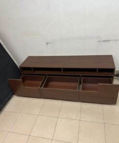 A modern wooden TV stand (media unit) in a dark brown (walnut) finish, featuring open shelves, three lower storage drawers, and a silver base. - Image 5