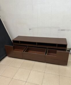 A modern wooden TV stand (media unit) in a dark brown (walnut) finish, featuring open shelves, three lower storage drawers, and a silver base. - Image 9