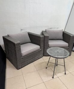 A compact outdoor seating set consisting of two grey synthetic rattan (PE Rattan) armchairs with comfortable grey cushions, plus a round table with a glass top. - Image 5