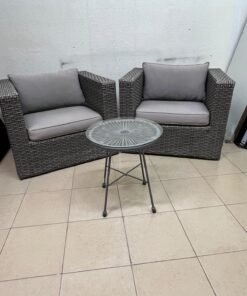 A compact outdoor seating set consisting of two grey synthetic rattan (PE Rattan) armchairs with comfortable grey cushions, plus a round table with a glass top. - Image 7
