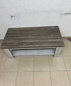A rectangular coffee table made of engineered wood featuring a two-tone design; the tabletop comes in a greyish-brown wood finish, while the frame, legs, and lower shelf are white or light grey. It resembles the "Angelic" coffee table from Home Box. - Image 3
