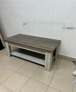 A rectangular coffee table made of engineered wood featuring a two-tone design; the tabletop comes in a greyish-brown wood finish, while the frame, legs, and lower shelf are white or light grey. It resembles the "Angelic" coffee table from Home Box. - Image 5