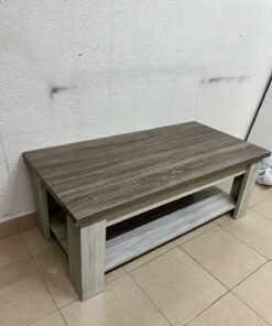 A rectangular coffee table made of engineered wood featuring a two-tone design; the tabletop comes in a greyish-brown wood finish, while the frame, legs, and lower shelf are white or light grey. It resembles the "Angelic" coffee table from Home Box. - Image 6