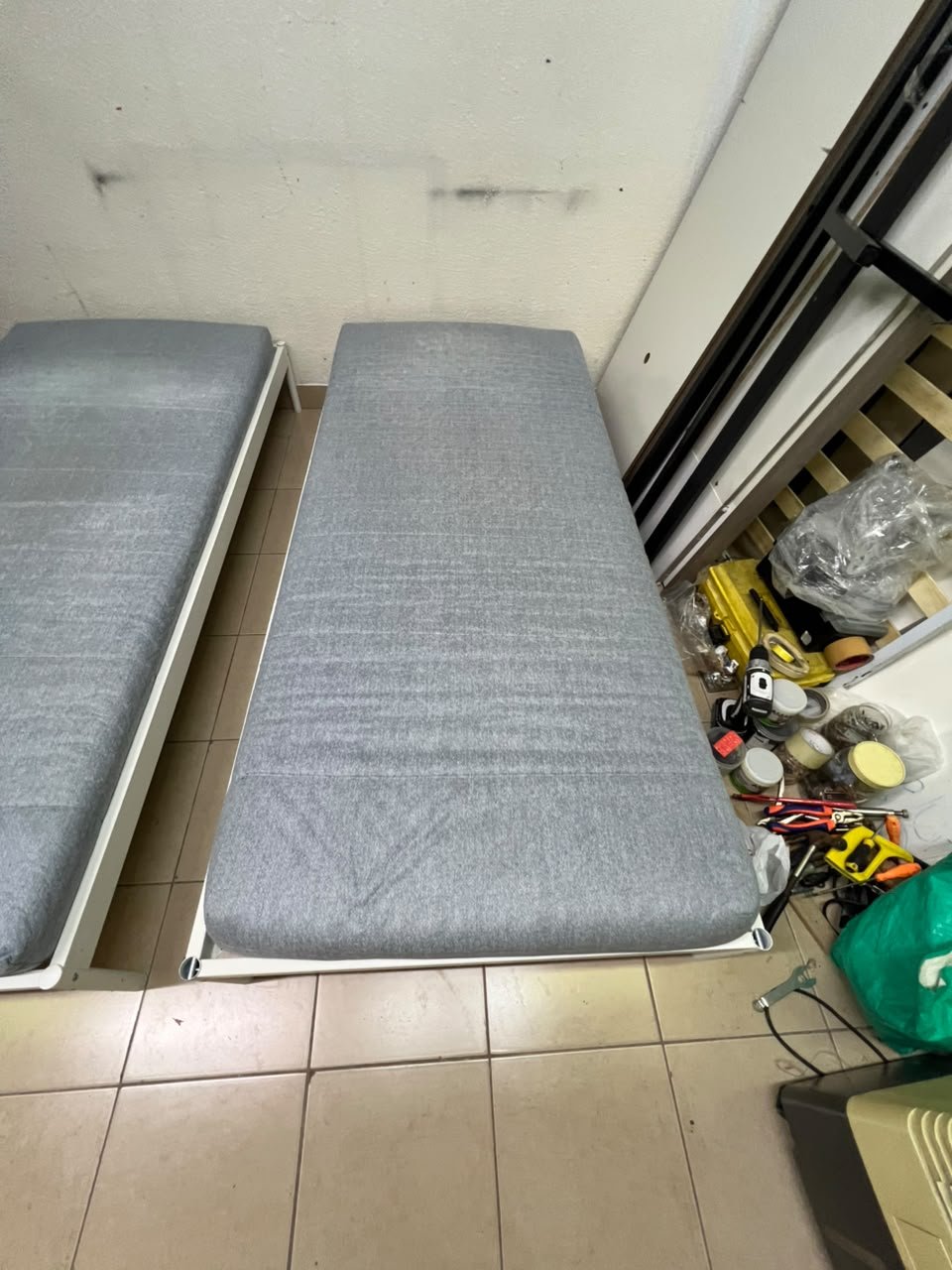 Two single beds with white metal frames, featuring lightweight foam mattresses in a light gray/blue color—similar to the ÅGOTNES foam mattress from IKEA. - Image 6