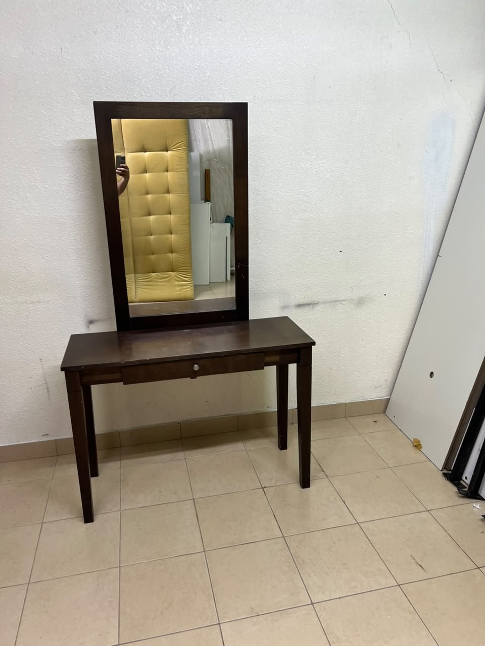 A dark brown (espresso) wooden vanity table with a minimalist design, featuring a rectangular surface, a small central drawer, and an upright vertical mirror set within a tall wooden frame. - Image 6