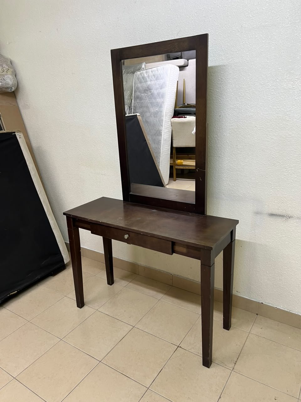 A dark brown (espresso) wooden vanity table with a minimalist design, featuring a rectangular surface, a small central drawer, and an upright vertical mirror set within a tall wooden frame. - Image 4