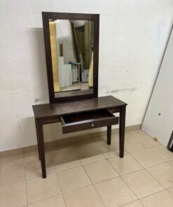 A dark brown (espresso) wooden vanity table with a minimalist design, featuring a rectangular surface, a small central drawer, and an upright vertical mirror set within a tall wooden frame. - Image 2