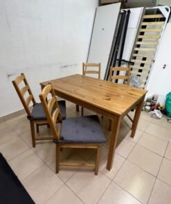 Solid wood dining table with 4 chairs (IKEA JOKKMOKK model) in an antique-stain pine finish, including grey seat cushions (IKEA JUSTINA model). - Image 6