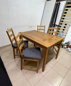 Solid wood dining table with 4 chairs (IKEA JOKKMOKK model) in an antique-stain pine finish, including grey seat cushions (IKEA JUSTINA model). - Image 7