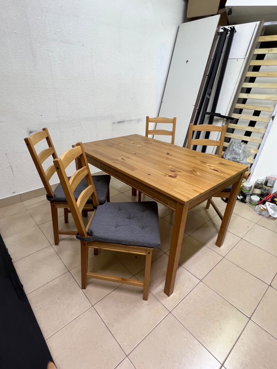 Solid wood dining table with 4 chairs (IKEA JOKKMOKK model) in an antique-stain pine finish, including grey seat cushions (IKEA JUSTINA model). - Image 7