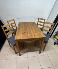 Solid wood dining table with 4 chairs (IKEA JOKKMOKK model) in an antique-stain pine finish, including grey seat cushions (IKEA JUSTINA model). - Image 8