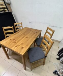 Solid wood dining table with 4 chairs (IKEA JOKKMOKK model) in an antique-stain pine finish, including grey seat cushions (IKEA JUSTINA model). - Image 2