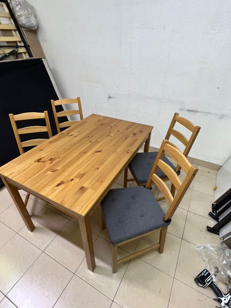 Solid wood dining table with 4 chairs (IKEA JOKKMOKK model) in an antique-stain pine finish, including grey seat cushions (IKEA JUSTINA model). - Image 2