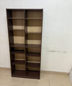 A dark brown open wooden bookcase (Walid)—a tall storage unit divided into two main sections, featuring multiple adjustable shelves.