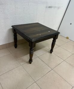 A square wooden table with a classic/rustic aesthetic (end table/side table), supported by four decorative, lathe-turned wooden legs in a dark brown finish.