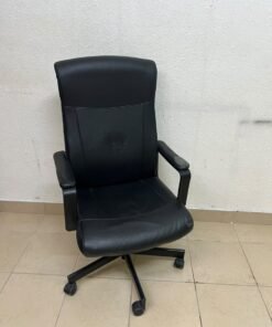 An IKEA swivel office chair—specifically the MILLBERGET model—in black. - Image 2
