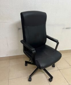 An IKEA swivel office chair—specifically the MILLBERGET model—in black.