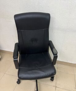An IKEA swivel office chair—specifically the MILLBERGET model—in black. - Image 6
