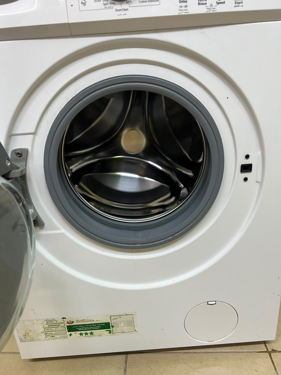 The image shows a Super General front-load washing machine (6 kg capacity, 1000 RPM, model similar to SGW6100NLED). - Image 5